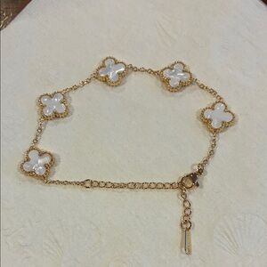 Elegant Gold and White Clover Bracelet